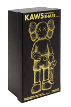 Kaws - Share (Black) vinyl figure in the box